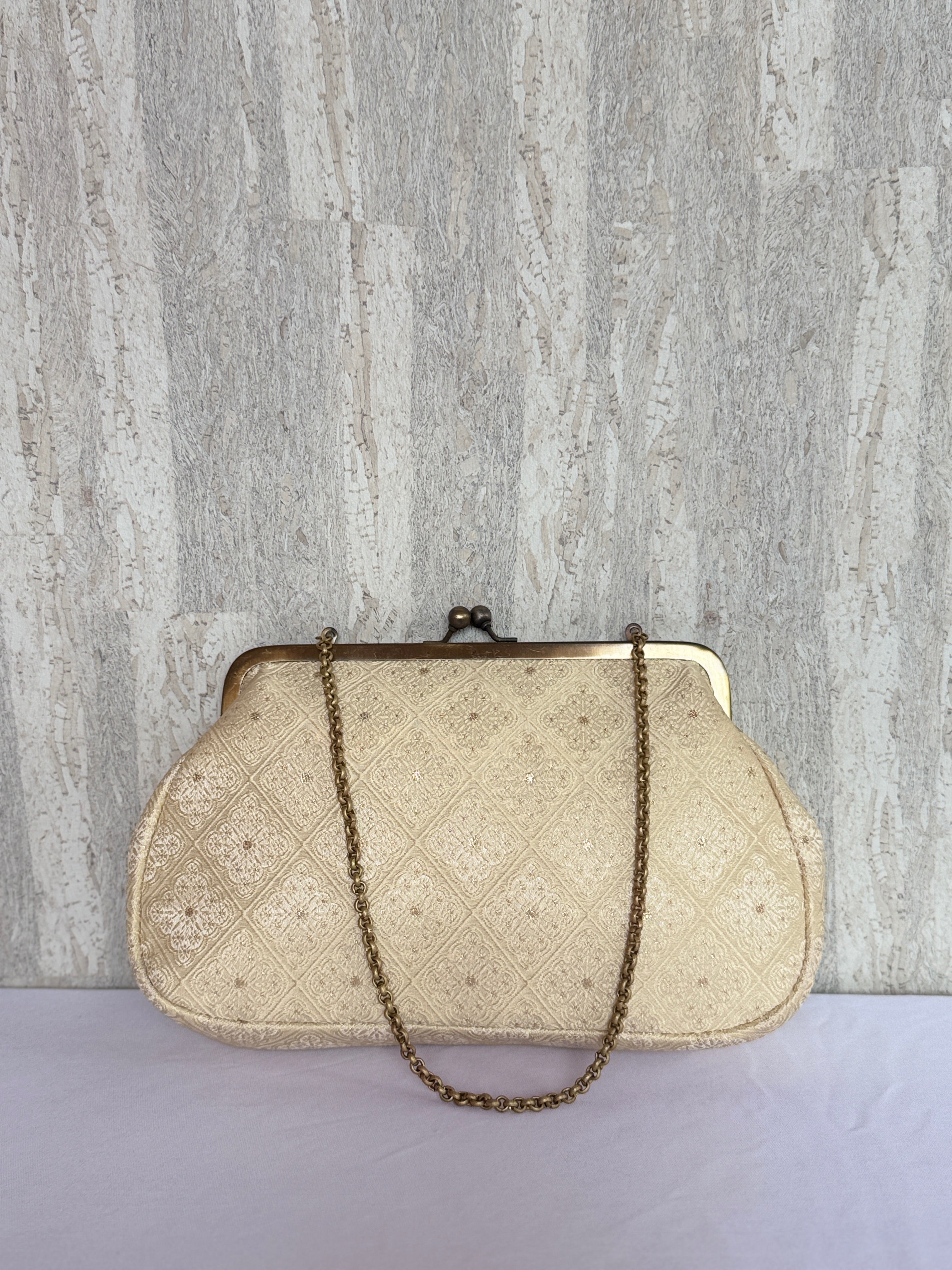 Ivory Ornamental Deluxe Clutch