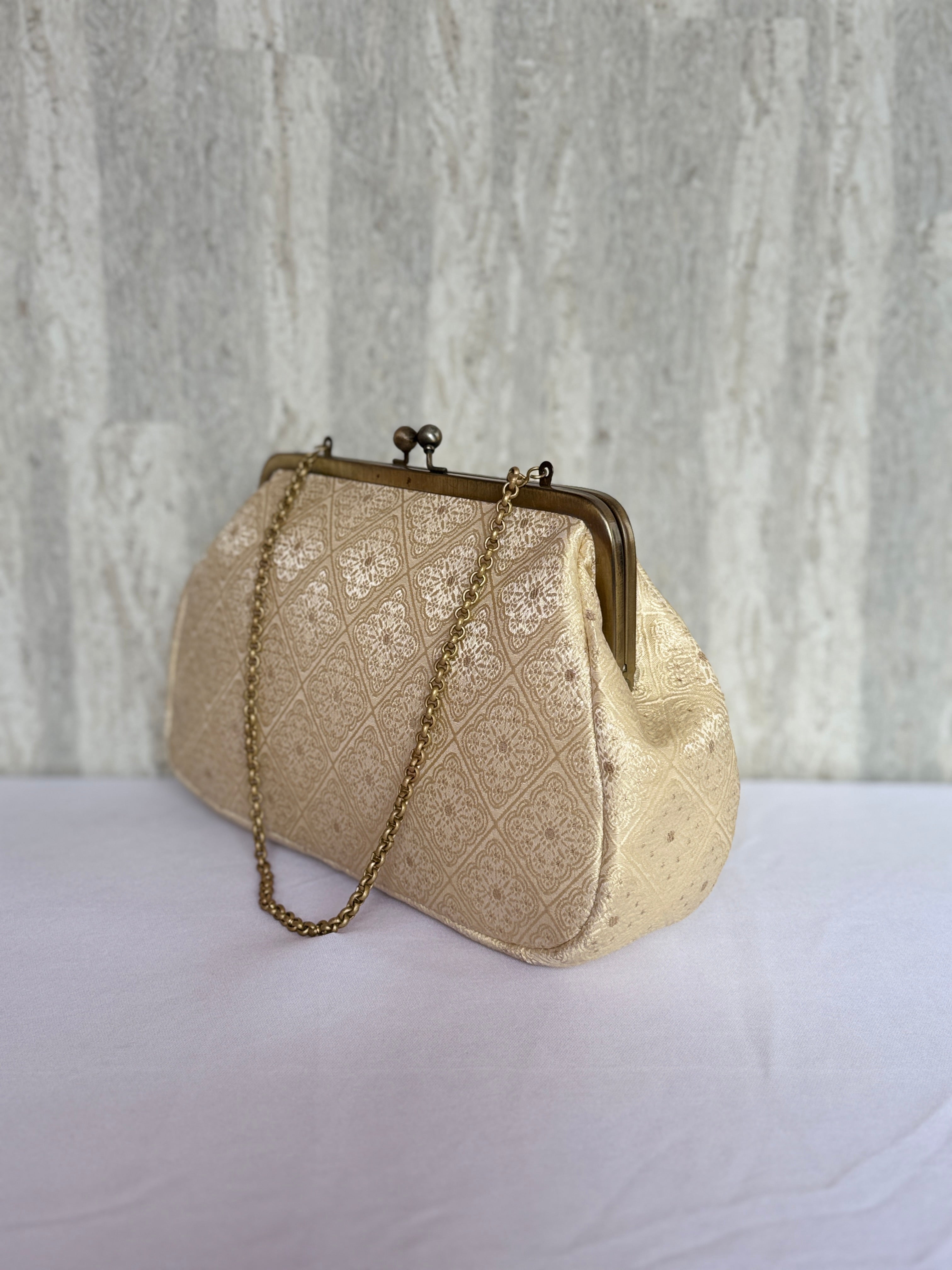 Ivory Ornamental Deluxe Clutch