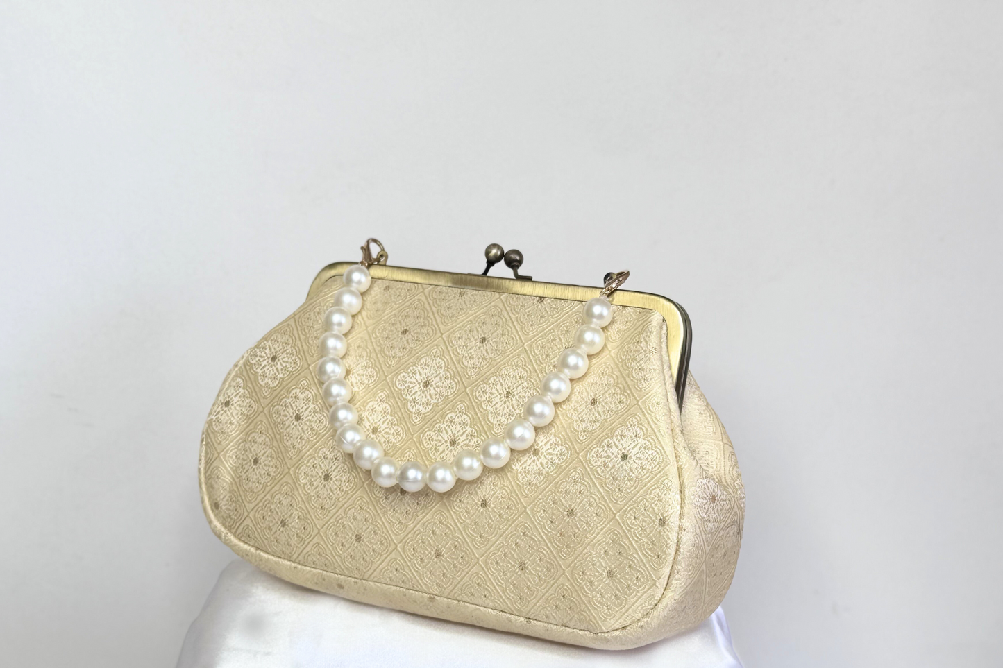 Ivory Ornamental Deluxe Clutch