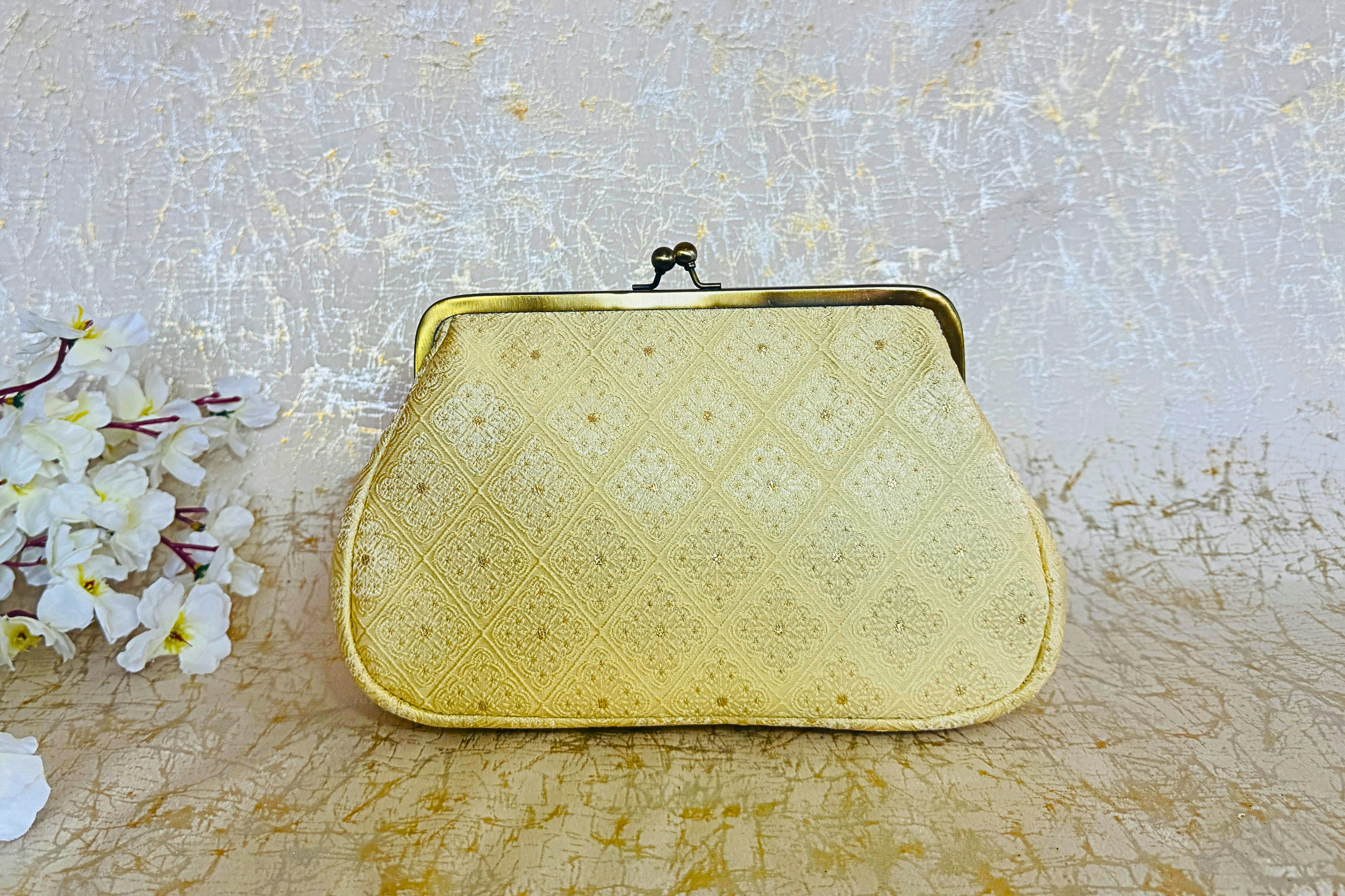 Ivory Ornamental Deluxe Clutch